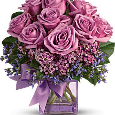 <div id="mark-1" class="m-pdp-tabs-marketing-description">Fresh as morning dew. Beautiful blooms in all shades of purple are gathered into a purple glass cube vase and tied with a purple bow. How perfectly purple!</div>
<div id="desc-1">
<ul>
 	<li>A pretty taffeta ribbon puts the finishing touch on this presentation of lavender roses, lavender waxflower, purple limonium and rich green salal.</li>
 	<li>Delivered in a glass cube vase.</li>
</ul>
</div>