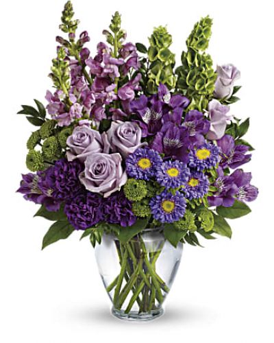 <div id="mark-3" class="m-pdp-tabs-marketing-description">Charmed, I'm sure! Win their hearts with this winsome bouquet of luxurious lavender blooms and delightful bells of Ireland, hand-delivered in a graceful glass vase.</div>
&nbsp;
<div id="desc-3">
<ul>
 	<li>This lovely bouquet features lavender roses, purple alstroemeria, purple carnations, lavender matsumoto asters, green button spray chrysanthemums, lavender snapdragons, bells of Ireland, huckleberry and lemon leaf.</li>
 	<li>Delivered in a clear glass vase.

<hr />

</li>
</ul>
</div>