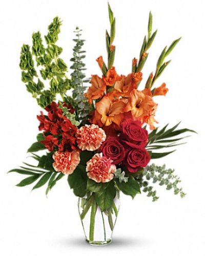 <div class="m-pdp-tabs-description">
<div id="mark-1" class="m-pdp-tabs-marketing-description">Red roses, red alstroemeria and orange gladioli in a glass vase - a lovely tribute that sends a message of hope and healing for those mourning their loss.</div>
</div>
<p id="arrngDescp">The brilliant arrangement includes red roses, red alstroemeria, orange gladioli, orange carnations and bells of Ireland, accented with assorted greenery.</p>