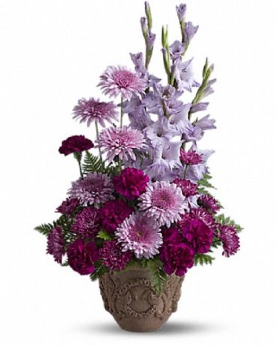 <div class="m-pdp-tabs-description">
<div id="mark-1" class="m-pdp-tabs-marketing-description">A towering display of blooms such as gladioli, carnations and chrysanthemums in royal hues of purple and lavender, presented in a Grecian-style urn, is a gracious representation of your heartfelt sentiments at a funeral, memorial service or wake.</div>
</div>
<p id="arrngDescp">A mix of fresh flowers such as gladioli, carnations and cushion spray chrysanthemums, in shades of lavender and purple - accented with ferns.</p>