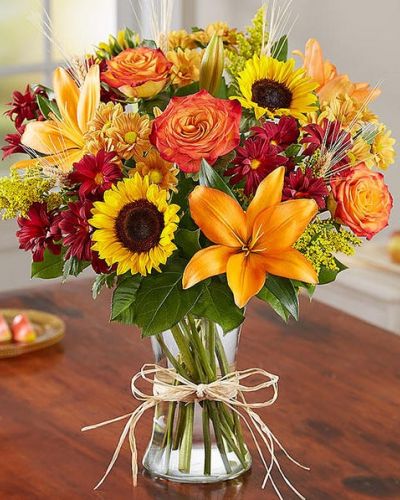 This wonderful autumn bouquet is gathered with fresh-picked flowers, revealing the rustic beauty of nature.

Shades of golden yellow, rich red and pops of orange create a timeless gift for someone special to enjoy.