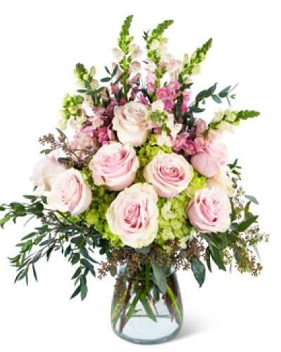 The Ethereal Beauty Bouquet is an unparalleled display of taste and elegance. Snapdragons and alstroemeria in pink are surrounded by green hydrangea and flowing greenery. When you want to send a floral gift she'll never forget, send her Ethereal Beauty.