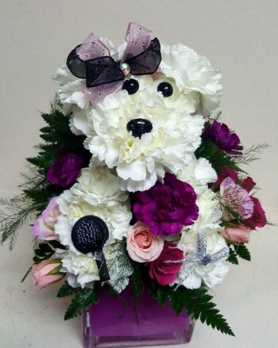 <p>Perfect for any pet lover, the Hot Diggity Dog Bouquet sends a touch of whimsy with your warmest regards. Celebrate them with this cute nod to man's best friend.</p>