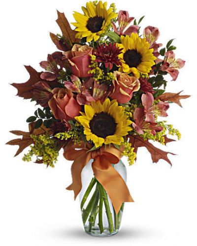 <div id="mark-1" class="m-pdp-tabs-marketing-description">This ravishingly rustic bouquet is like a burst of country charm. Complementing the sunny sunflowers are orange bi-color roses and orange and rust chrysanthemums - all delightfully tied up with a bright orange ribbon. Absolutely irresistible.</div>
<p>&nbsp;</p>
<div id="desc-1">The cheerful arrangement includes orange bi-color roses, yellow sunflowers, dark orange alstroemeria and rust cushion spray chrysanthemums accented with orange ribbon and assorted greenery.</div>