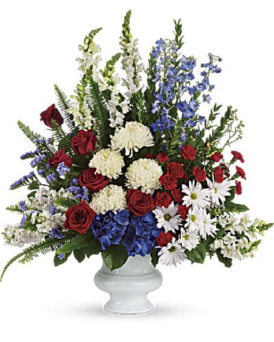 <div class="m-pdp-tabs-description">
<div id="mark-1" class="m-pdp-tabs-marketing-description">A dazzling display of patriotic red, white and blue flowers sends a silent yet poignant statement about hope, freedom and the strength to endure. This proud bouquet is a testament to life that is sure to be appreciated.</div>
</div>
<p id="arrngDescp">A beautiful mix of all-American red, white and blue flowers such as hydrangea, roses, miniature carnations, snapdragons, chrysanthemums and more are perfectly arranged in a white urn.</p>