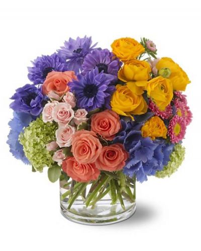 <p>Add a bit of poetry to someone's day with this spectacular bouquet featuring pink roses. Gathered with whimsical purple anemone, sunny yellow ranunculus and more, it's a perfect sonnet of color delivered in a glass cylinder vase.</p>