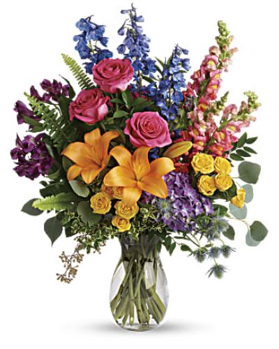 <div id="mark-3" class="m-pdp-tabs-marketing-description">A rainbow of beauty for any occasion. Purple hydrangea, pink roses and orange lilies positively pop in this bright bouquet, featuring all the colors of the rainbow.</div>
<p>&nbsp;</p>
<div id="desc-3">
<ul>
<li>This colorful bouquet includes purple hydrangea, pink roses, yellow spray roses, orange asiatic lilies, purple alstroemeria, blue delphinium, pink snapdragons, blue eryngium, huckleberry, oregonia, Israeli ruscus, sword fern, silver dollar eucalyptus, seeded eucalyptus, and lemon leaf.</li>
</ul>
</div>