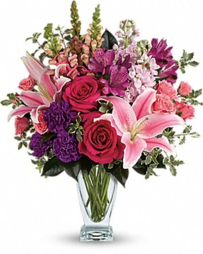 <div class="m-pdp-tabs-description">
<div id="mark-3" class="m-pdp-tabs-marketing-description">Hand-delivered in a shapely glass vase, this sumptuous arrangement of roses and lilies is a lavish way to celebrate a special day - or surprise someone just because!</div>
</div>
<p id="arrngDescp">Hot pink roses, pink spray roses, pink oriental lilies, purple alstroemeria, purple carnations, light pink stock and pink snapdragons are arranged with pitta negra and camellia leaves. Delivered in a clear Couture vase.</p>