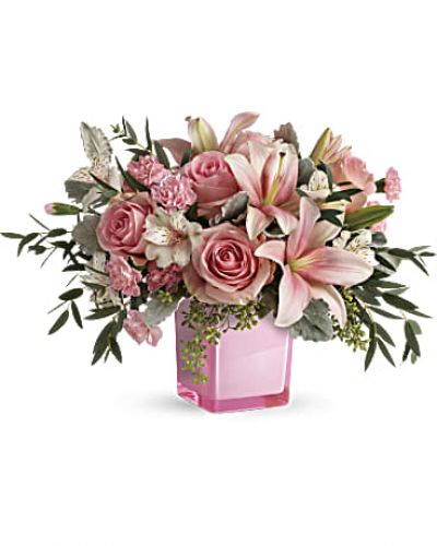 <p>Just fabulous! From its perky pink cube and perfect pink roses, to its textural greens and dramatic pink lilies, this chic bouquet is flora at its finest!<br />
This gorgeous bouquet features pink roses, pink asiatic lilies, white alstroemeria, pink miniature carnations, dusty miller, parvifolia eucalyptus, and seeded eucalyptus.</p>