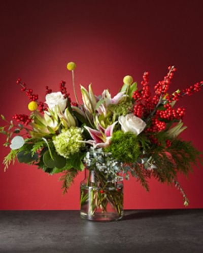 There's nothing like finding this Wilds of Winter Bouquet at your doorstep. This enchanting arrangement is overflowing with floral variety and is guaranteed to be a luxurious gift for your loved ones.