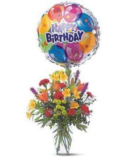 Take their birthday to brand new heights with this colorful arrangement of flowers and a high-flying birthday balloon.
Alstroemeria, carnations, chrysanthemums and lilies are delivered in a clear glass vase with attached foil balloon.