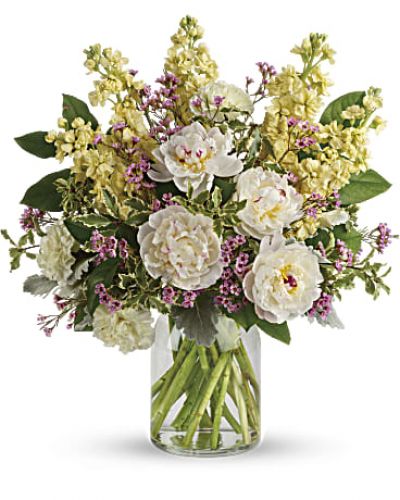 <div id="mark-3" class="m-pdp-tabs-marketing-description">Chic and serene, this dreamy bouquet of wondrous white peonies and creamy blooms in a milk jug vase sends your very best wishes for a stylish spring!</div>
<p>&nbsp;</p>
<div id="desc-3">
<ul>
<li>This serene arrangement features white peonies, light yellow carnations, light yellow stock, lavender waxflower, dusty miller, pitta negra, and lemon leaf.</li>
<li>Delivered in a clear glass vase.</li>
</ul>
</div>