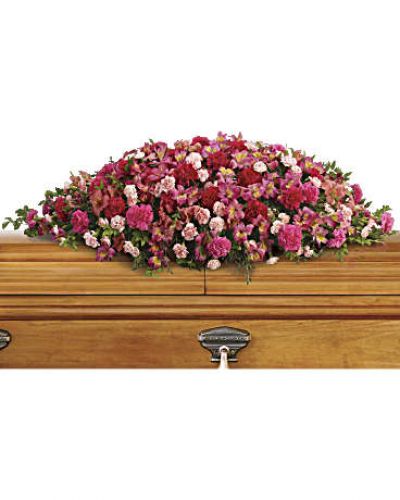 <div id="mark-1" class="m-pdp-tabs-marketing-description">
<hr />
<p>A magnificent cascade of pink floral favorites accented with huckleberry conveys an outpouring of love and respect for one who has passed.
</p></div>
<div id="desc-1">
<ul>
<li>The sumptuous bouquet includes dark pink alstroemeria, hot pink carnations, pink carnations and miniature light pink carnations accented with huckleberry and eucalyptus.</li>
</ul>
</div>