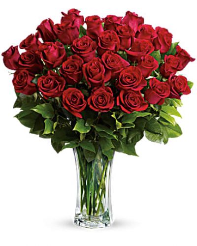 Shout your love from the rooftops with long stemmed red roses artistically arranged in a cut crystal vase. These red roses make a spectacular romantic bouquet. She'll be yours forever.
Standard- 24 Elegant Roses
Deluxe-30 Beautiful Blooms
Premium-36 Exquisite Roses