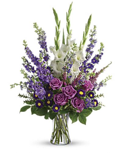 <div class="m-pdp-tabs-description">
<div id="mark-1" class="m-pdp-tabs-marketing-description">Lavender and white flowers make a grand statement in this bouquet. Cherish your memories with this display of lavender larkspur and roses, deep purple asters, pure white gladioli and the softest pink heather.</div>
</div>