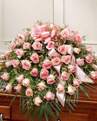 <p>Celebrate a life well lived and loved with this beautiful pink casket spray. It features gorgeous long-stem pink roses, waxflower and vibrant greenery. Traditionally sent by the immediate family to the funeral home.</p>