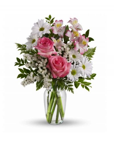 <p>This lovely bouquet of pink roses, pink alstroemeria and white mums in a sparkling clear glass vase is an endearing way to Treat Your Sweet. It is an inspired choice for brightening a birthday, anniversary, special occasion or just because.</p>