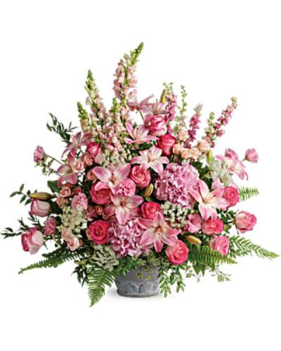 <div id="mark-3" class="m-pdp-tabs-marketing-description">Full of grace and light, this majestic bouquet of pink blooms and fresh greenery is a glorious addition to the service.</div>
<div id="desc-3">
<ul>
 	<li>Light pink hydrangea, pink roses, light pink spray roses, light pink asiatic lilies, pink lisianthus, pink larkspur, light pink snapdragons, and Queen Anne's lace are arranged with Italian ruscus, huckleberry, pitta negra, sword fern, flat fern, and lemon leaf.</li>
</ul>
</div>