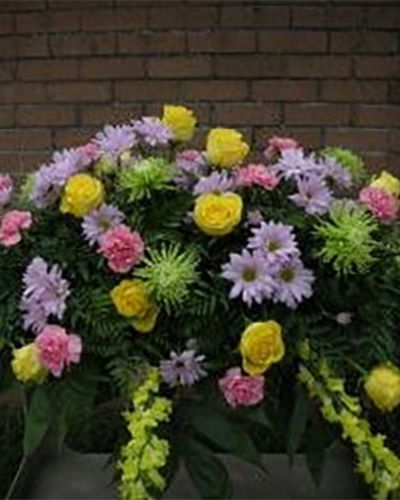 <p>A graceful and magnificent cascade of delicate pale pink, purple, yellow and green flowers conveys everlasting affection for the radiant spirit being honored, and gently eases sorrow for those paying respect.</p>
<ul id="prodDetailDelivery">
<li><span style="color: red;"><b>Local Delivery Only</b></span></li>
</ul>