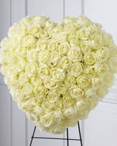 <p>The FTD® Elegant Remembrance™ Standing Heart is an exquisite display of peace and love. 77 stems of white roses are artfully arranged in the shape of a heart and presented on a wire easel, creating a simply beautiful tribute for their final farewell service.</p>