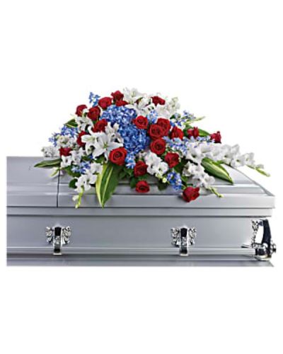 <div id="mark-1" class="m-pdp-tabs-marketing-description">For a military or private funeral, this classic half-couch casket spray is a proud and patriotic way to pay lasting tribute to an loved one's esteemed memory, life of service and dedication to freedom.</div>
<div id="desc-1">
<ul>
 	<li>Bold flowers such as blue hydrangea and delphinium, classic red roses, and white oriental lilies and gladioli form an all-American display honoring the deceased and their love of country.</li>
</ul>
</div>