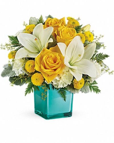 <div class="m-pdp-tabs-description">
<div id="mark-1" class="m-pdp-tabs-marketing-description">
<p>Inspired by the sunny sound of children's laughter, this lighthearted bouquet of golden roses and fragrant white lilies is presented in a stunning cube vase. What a stylish way to make someone smile!
</p></div>
</div>
<p>This cheerful bouquet features yellow roses, white asiatic lilies, white carnations, yellow button spray chrysanthemums, seeded eucalyptus, dusty miller and leatherleaf fern. Delivered in a glass cube.</p>